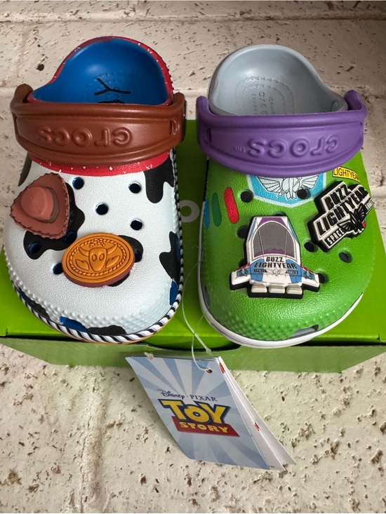 CROCS Other - CROCS Kids Toy Story Woody & Buzz Lightyear Clogs - White/Brown & Green/Purple